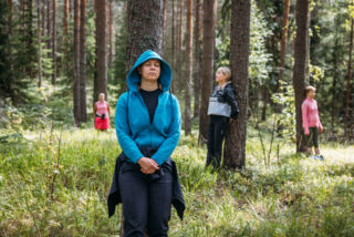 visitors relaxing in the forest